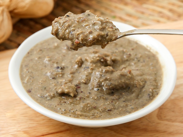 Vai trò của cua đồng trong món cá kho làng Vũ Đại